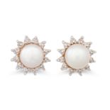 A PAIR OF DIAMOND AND PEARL CLUSTER EARRINGS, the pink cream tone pearls to a diamond surround,
