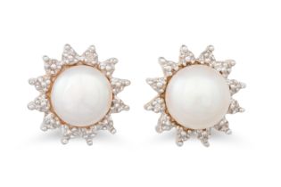 A PAIR OF DIAMOND AND PEARL CLUSTER EARRINGS, the pink cream tone pearls to a diamond surround,
