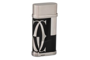 A TWO TONE CARTIER GAS LIGHTER, Ref no. 404323, purchased 17/0/2012 from Cartier, London, fitted
