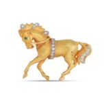 A DIAMOND AND EMERALD BROOCH, modelled as a galloping horse, mounted in 18ct yellow gold, 12.8 g