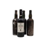 A COLLECTION OF FOUR VINTAGE PORT BOTTLES, to include a bottle of Sandeman Vintage Port 1963 (