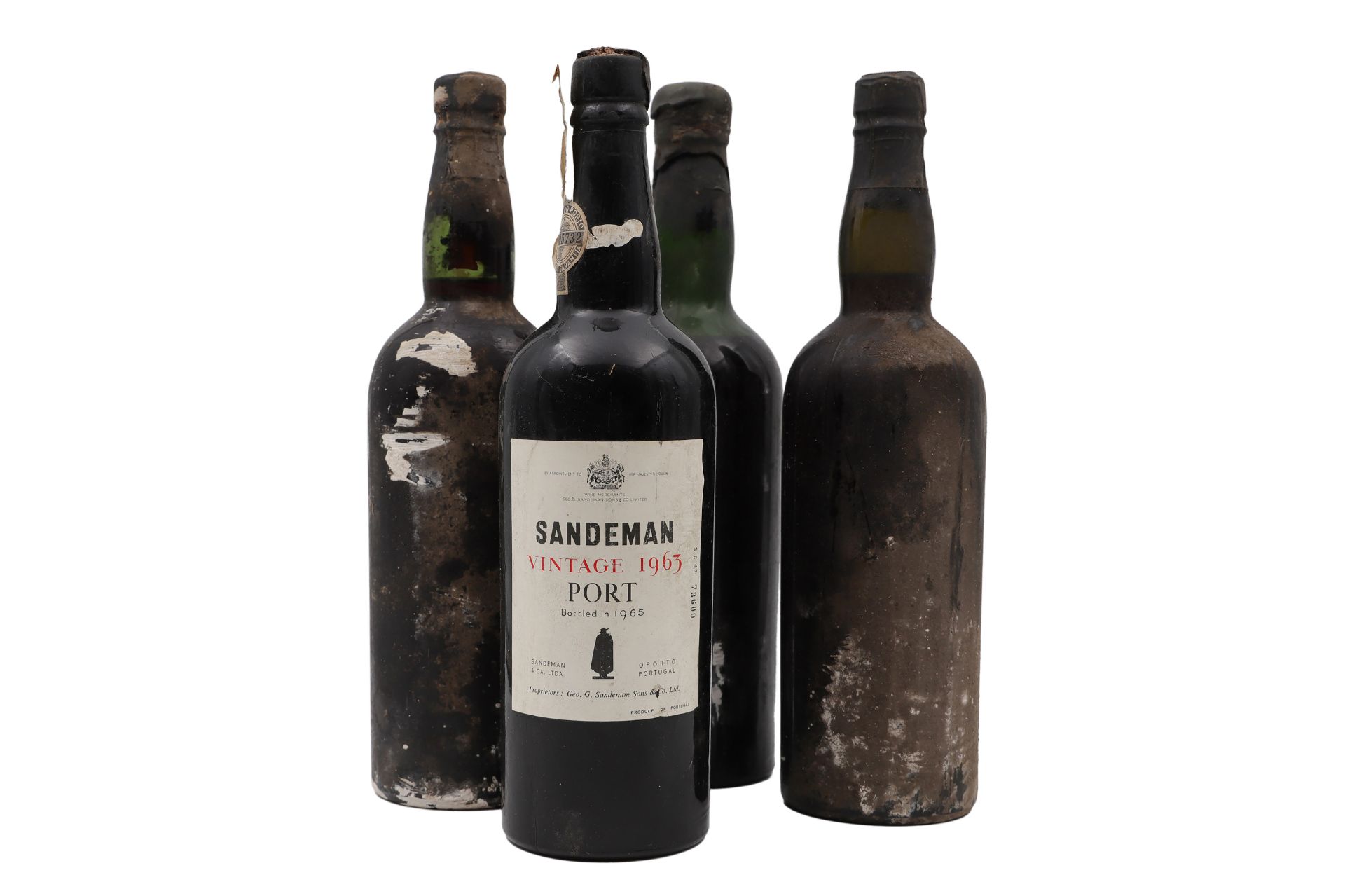A COLLECTION OF FOUR VINTAGE PORT BOTTLES, to include a bottle of Sandeman Vintage Port 1963 (