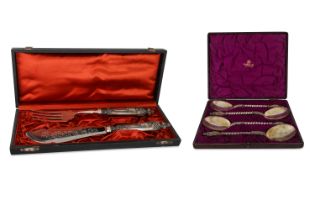 A CASED PAIR OF VICTORIAN SILVER PLATED FISH KNIFE & FORK SERVERS, together with a cased pair of