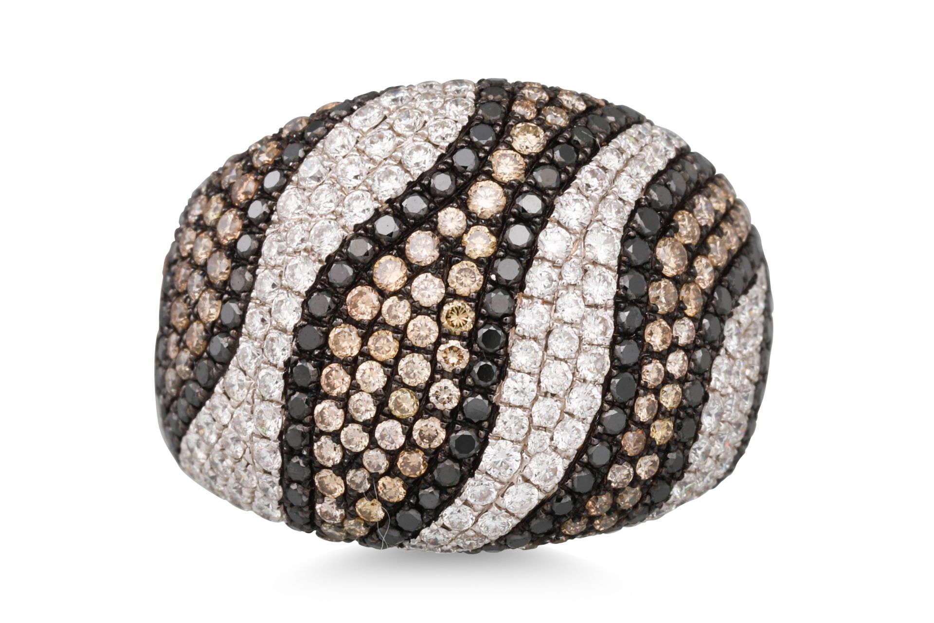 A DIAMOND BOMBE RING, the white and brown diamonds of abstract form, mounted in 18ct white gold,