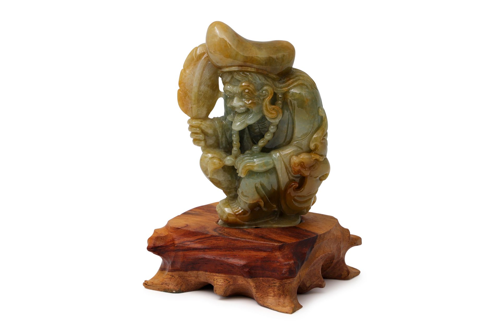 A CHINESE CARVED JADE FIGURE, of a crouching 'TAU' from the legends of JI Gong, the living Buddha,