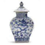 A. CHINESE BLUE AND WHITE FACETED DRAGON JAR WITH COVER, MING DYNASTY (1368-1644)
