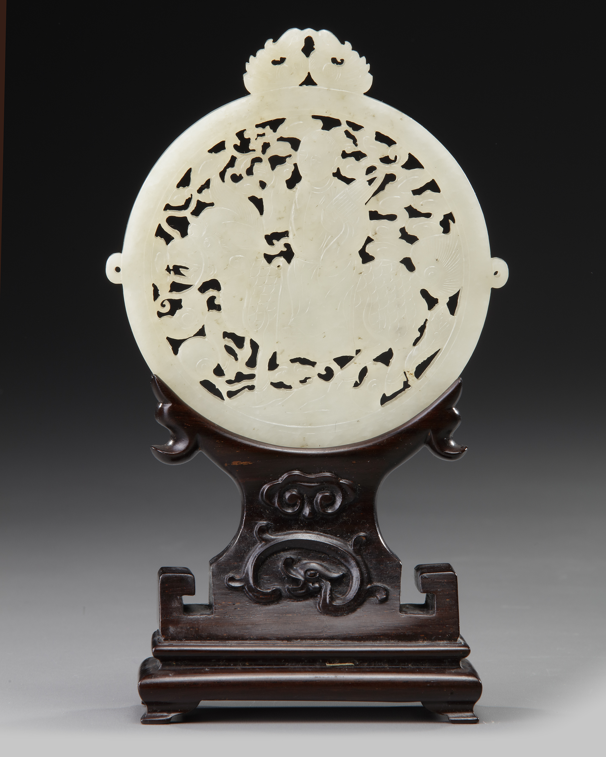 A CHINESE WHITE JADE ARCHAISTIC OPENWORK PLAQUE ON A WOODEN STAND, 19TH-20TH CENTURY - Image 3 of 4