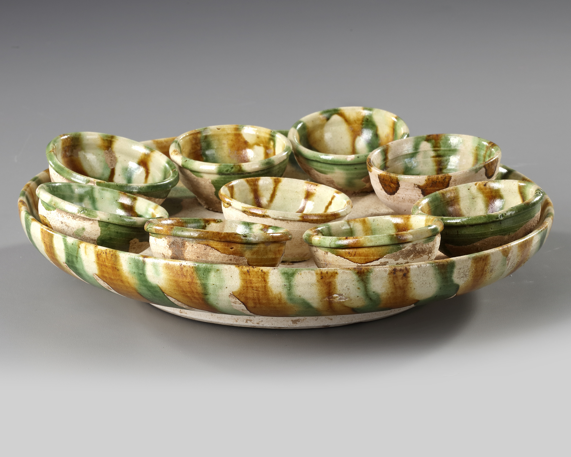 A CHINESE SANCAI GLAZED TRAY AND NINE CUPS, TANG DYNASTY (618-906 AD) - Image 4 of 4