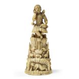 AN INDO-PORTUGUESE CARVED IVORY FIGURE OF CHRIST AS THE GOOD SHEPHERD, INDIA, GOA, 17TH CENTURY