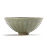 A FINE MOULDED CHINESE LONGQUAN CELADON 'LOTUS' BOWL, SOUTHERN SONG DYNASTY (1127-1279)