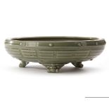 A CHINESE LONGQUAN CELADON 'EIGHT TRIGRAMS' TRIPOD CENSER LATE YUAN/EARLY MING DYNASTY (13TH-14TH CE