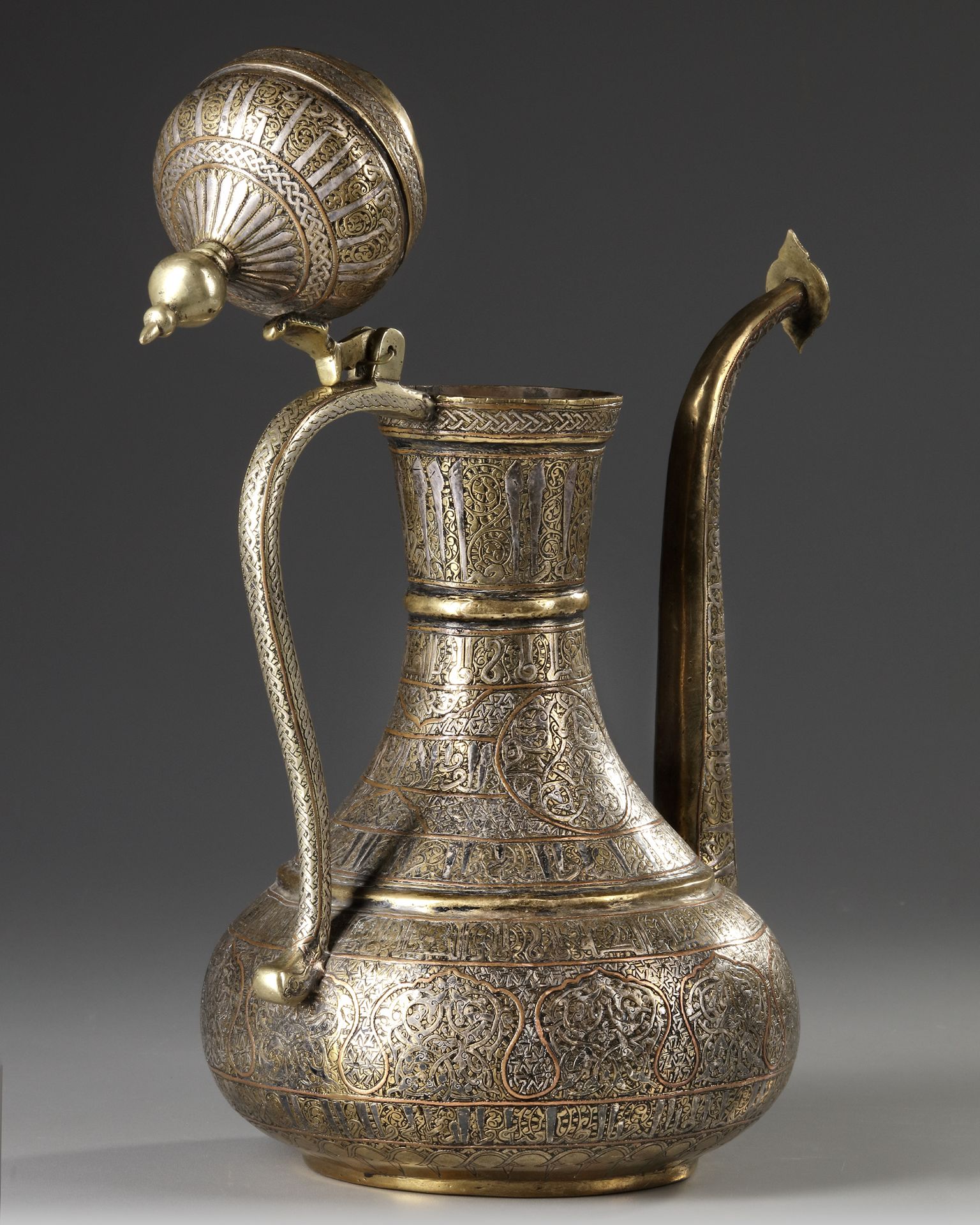 A FINE MAMLUK REVIVAL SILVER AND COPPER INLAID BRASS EWER, 19TH CENTURY - Image 3 of 4