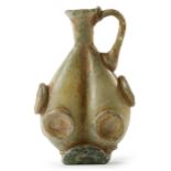 AN EARLY ISLAMIC GLASS FLASK, NEAR EAST, CIRCA 8TH-10TH CENTURY