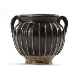 A CHINESE BLACK-GLAZED RIBBED JAR, NORTHERN SONG-JIN DYNASTY (960-1234)