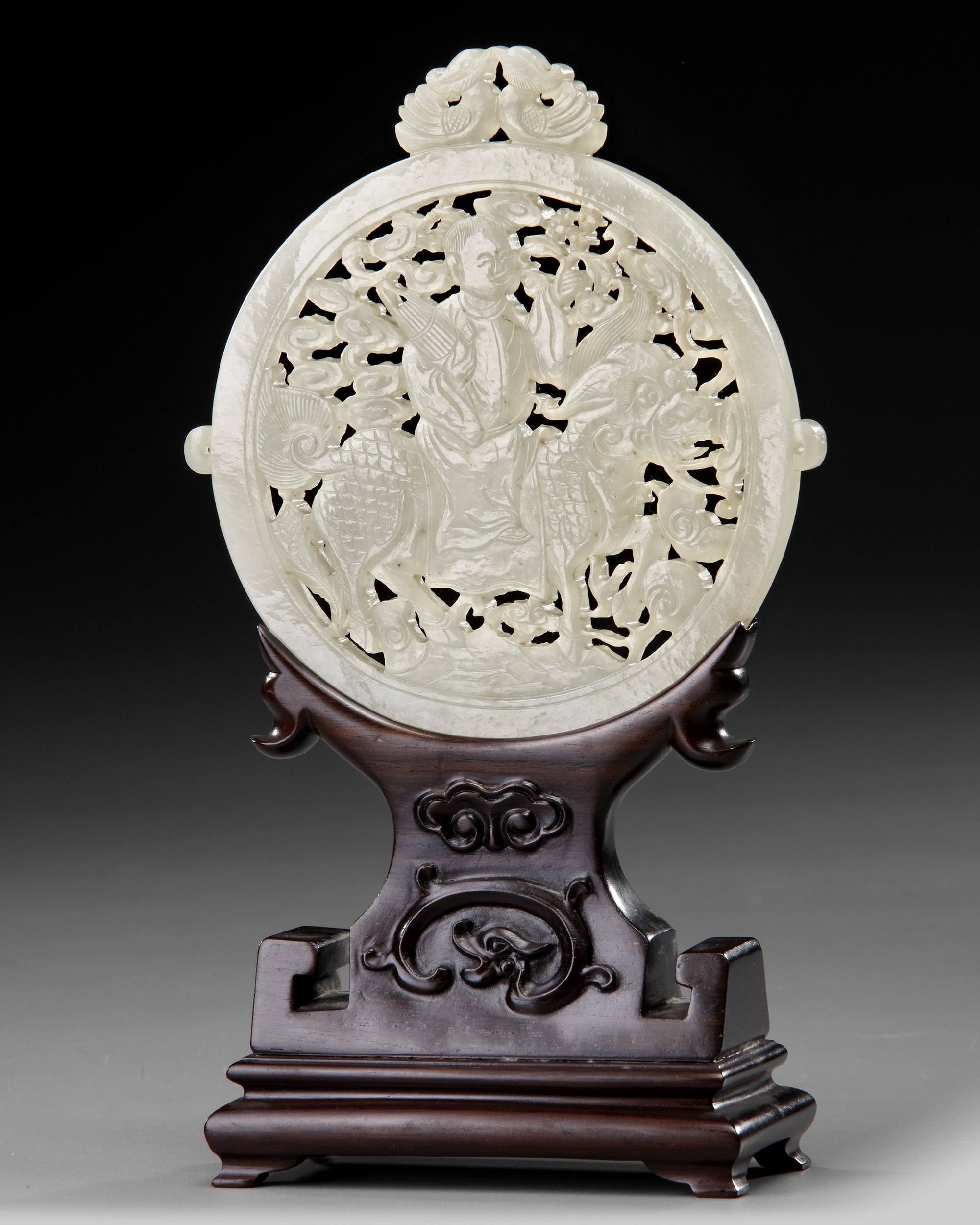 A CHINESE WHITE JADE ARCHAISTIC OPENWORK PLAQUE ON A WOODEN STAND, 19TH-20TH CENTURY - Image 2 of 4