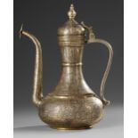 A FINE MAMLUK REVIVAL SILVER AND COPPER INLAID BRASS EWER, 19TH CENTURY