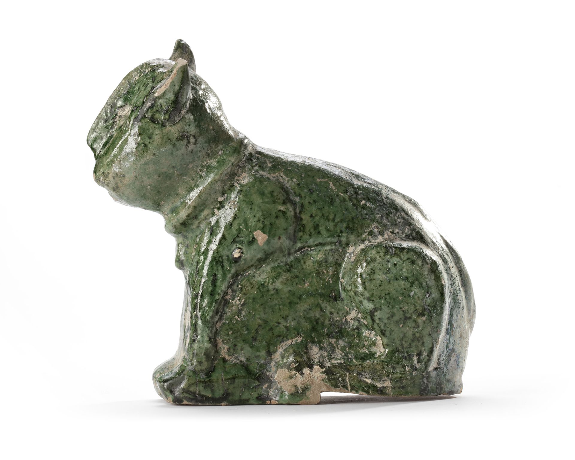 AN UMAYYAD POTTERY SCULPTURE OF A FELINE, 8TH CENTURY