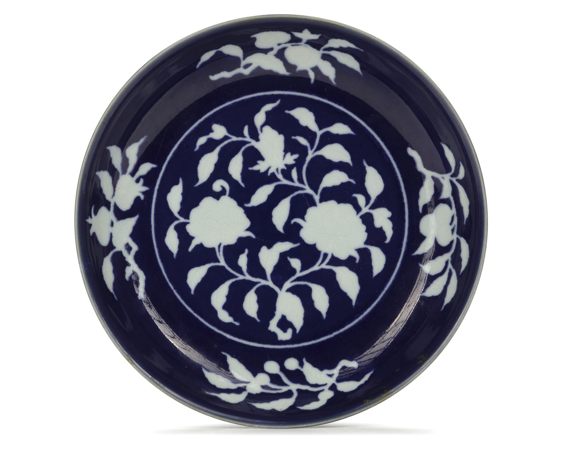 A CHINESE BLUE AND WHITE REVERSE-DECORATED POMEGRANATE DISH,MING DYNASTY (1368-1644) OR LATER