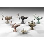 SIX PERSIAN BRONZE OIL LAMPS, SELJUK 12TH-13TH CENTURY AND LATER