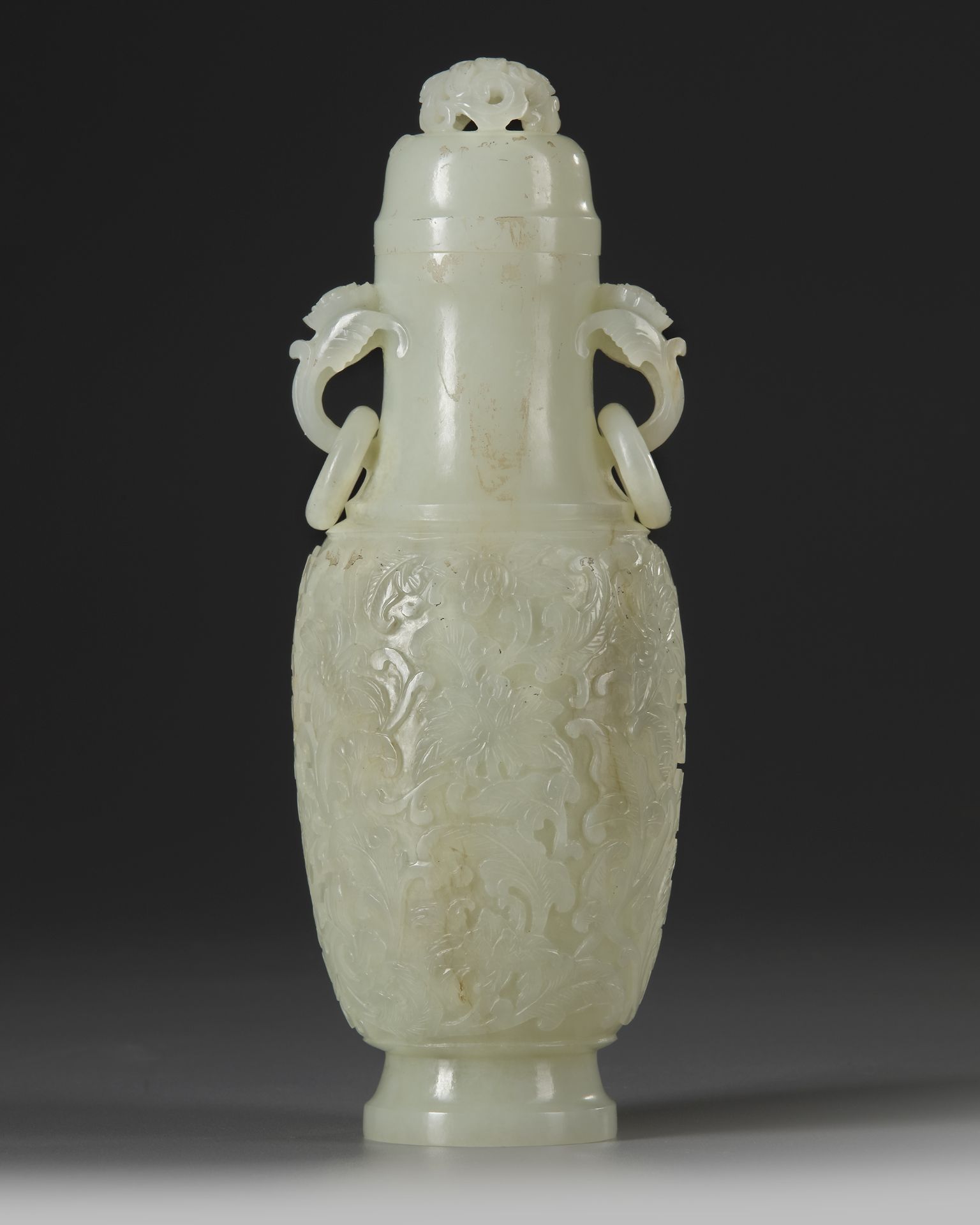 A CHINESE CARVED JADE VASE AND COVER, QING DYNASTY (1644-1911)