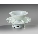 A CHINESE 'QINGBAI' CUP AND STAND, SONG DYNASTY (960-1279 AD)