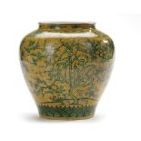 A CHINESE YELLOW-GROUND GREEN ENAMELED JAR, MING DYNASTY (1368-1644) OR LATER