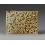 A CHINESE JADE OPENWORK DRAGON PLAQUE
