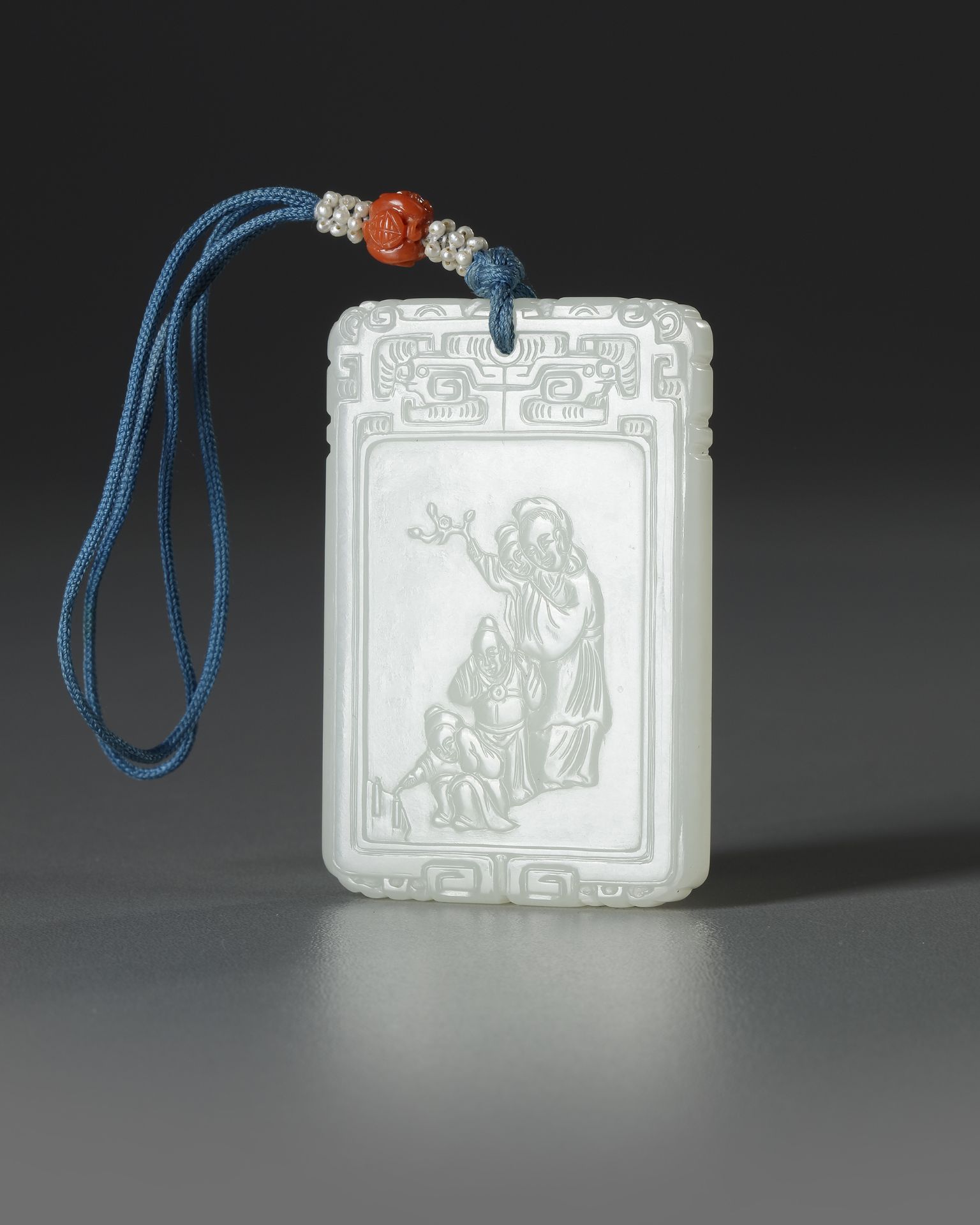 A CHINESE PALE CELADON JADE PLAQUE, QING DYNASTY (1644-1911)
