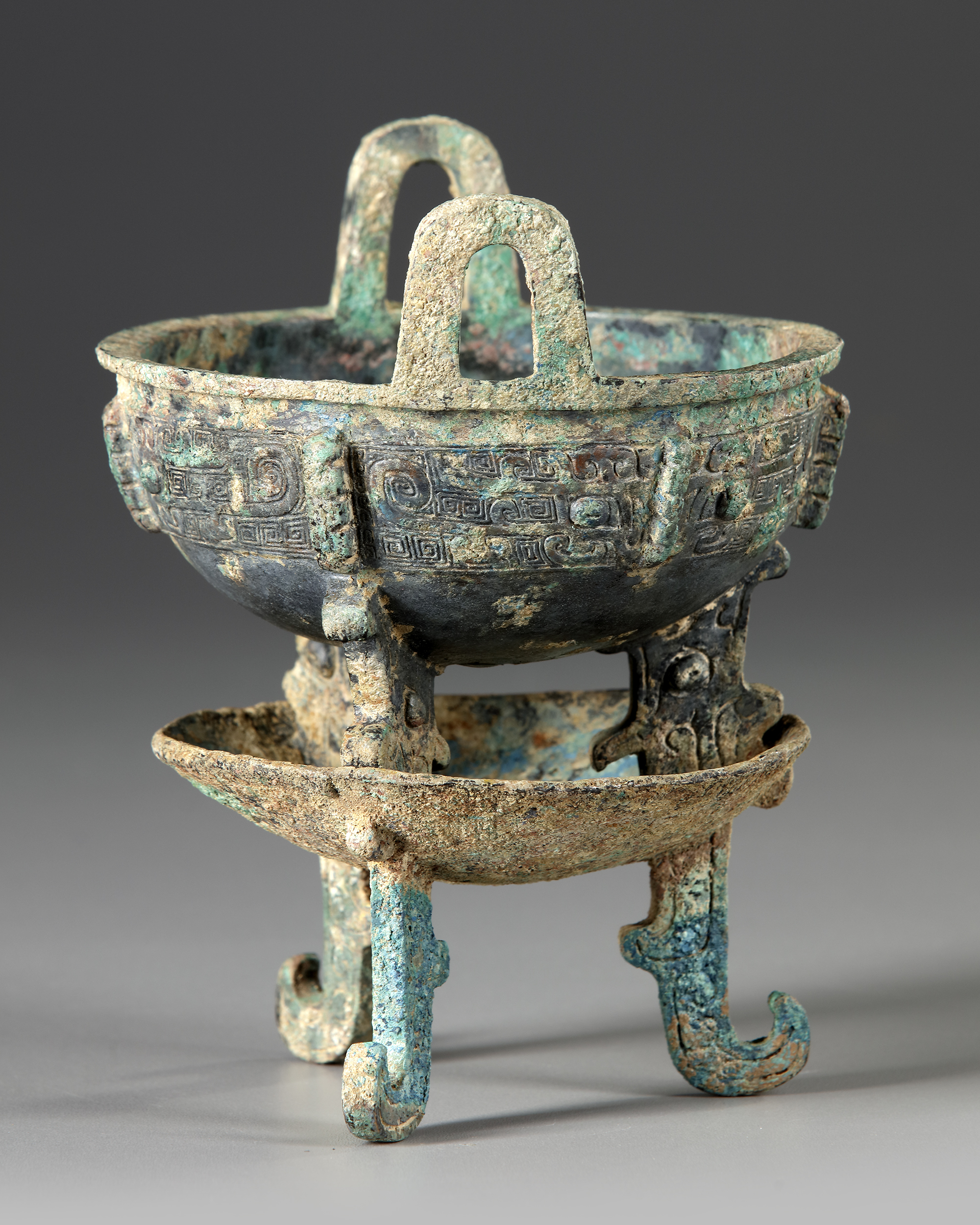 A CHINESE ARCHAIC BRONZE RITUAL FOOD VESSEL ( CHANG ZI DING), EARLY WESTERN ZHOU DYNASTY 1046-771 B