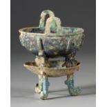 A CHINESE ARCHAIC BRONZE RITUAL FOOD VESSEL ( CHANG ZI DING), EARLY WESTERN ZHOU DYNASTY 1046-771 B