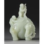 A CELADON JADE CARVING OF TWO BOYS WASHING AN ELEPHANT, 19TH CENTURY