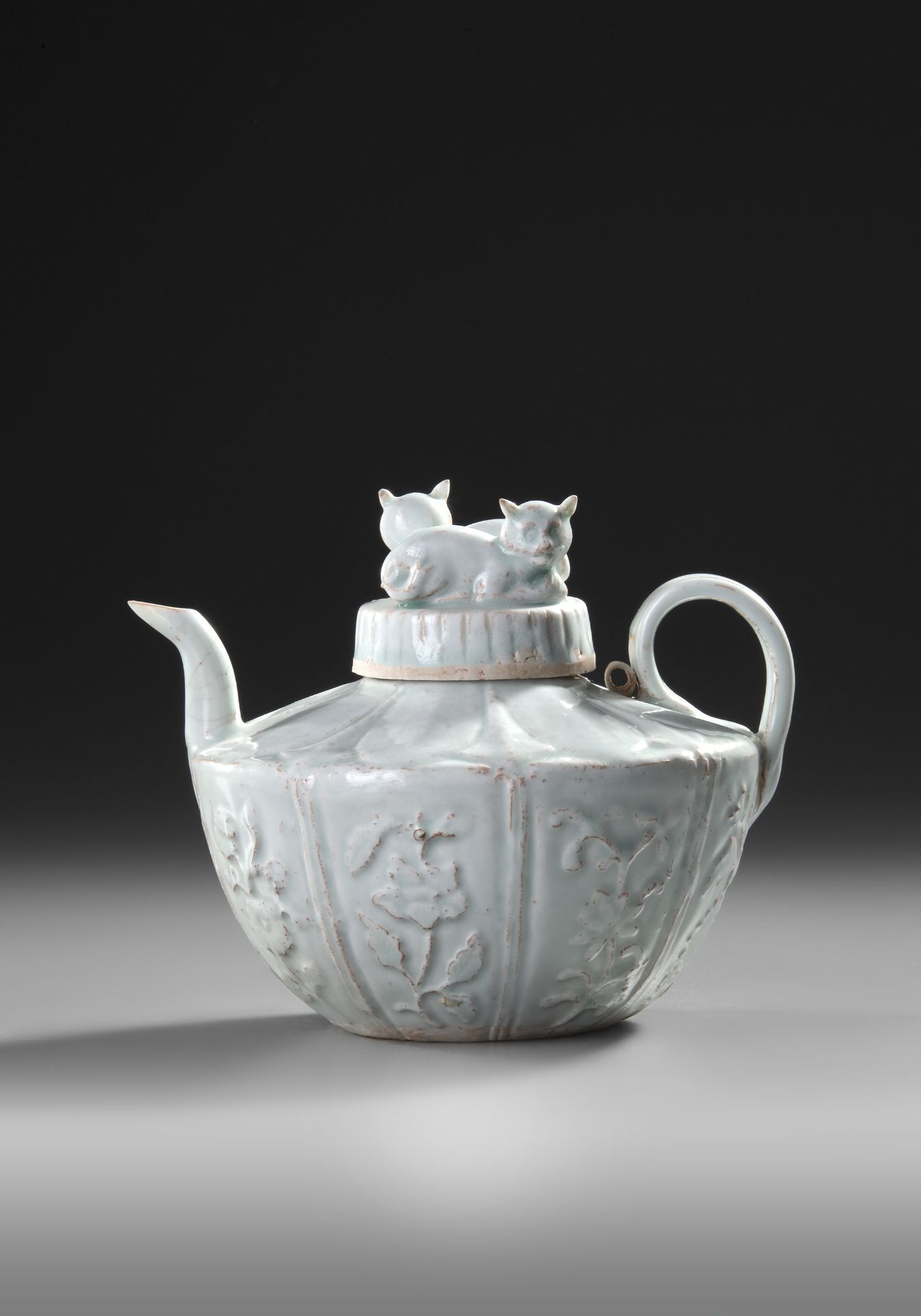 A CHINESE QINGBAI RECUMBENT CATS EWER AND COVER, NORTHERN SONG DYNASTY (960–1127)