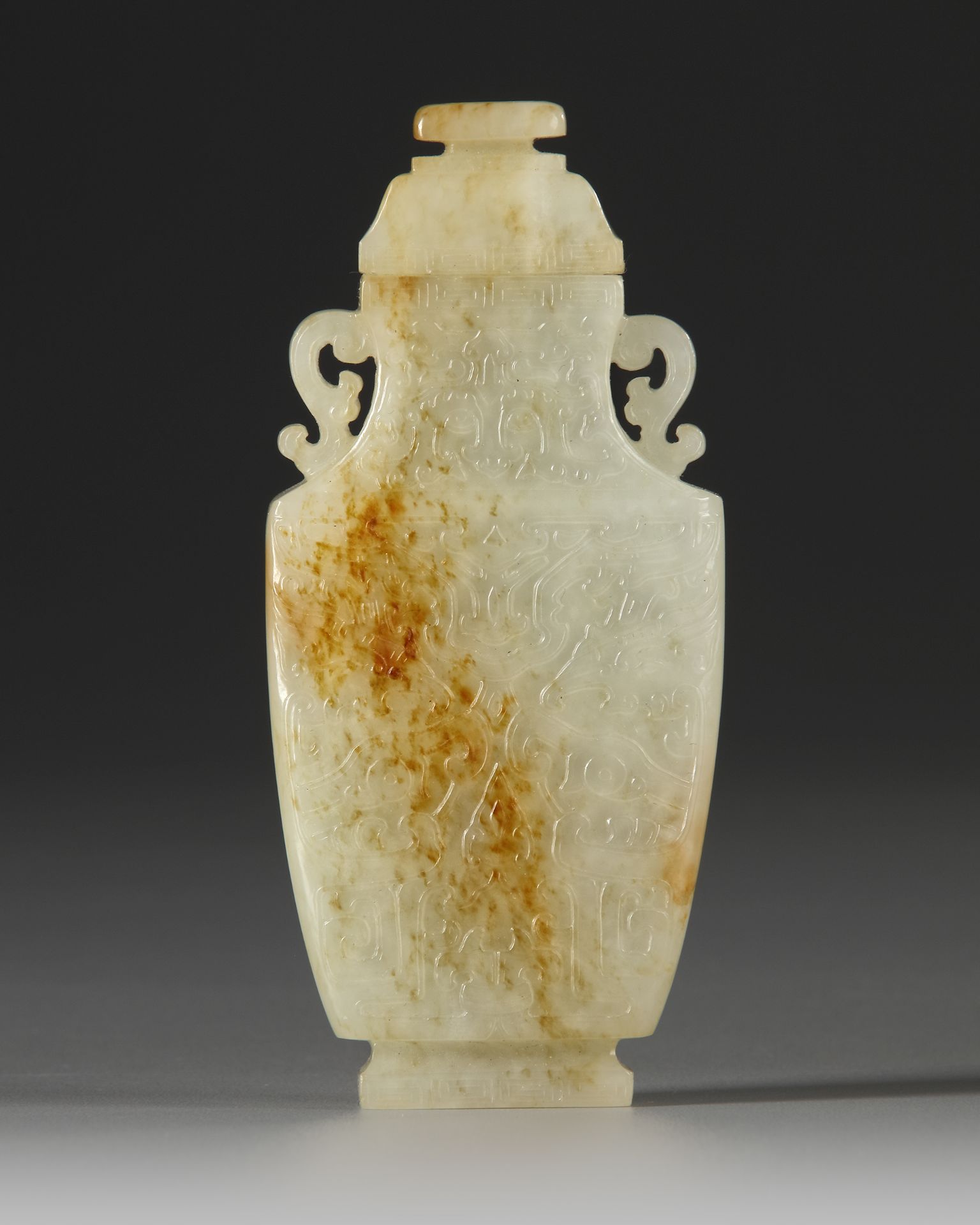 A CHINESE JADE ARCHAISTIC VASE AND COVER, 19TH CENTURY