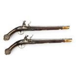 A PAIR OF OTTOMAN SILVER-MOUNTED ORIENTAL FLINTLOCK PISTOLS, CIRCA 1820 - 1830