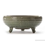 A CHINESE LONGQUAN CELADON 'EIGHT TRIGRAMS' TRIPOD CENSER, LATE YUAN, EARLY MING DYNASTY (13TH-14TH