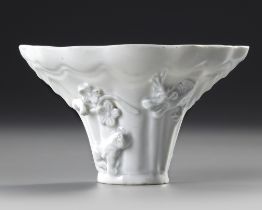 A CHINESE BLANC DE CHINE LIBATION CUP, 18TH CENTURY