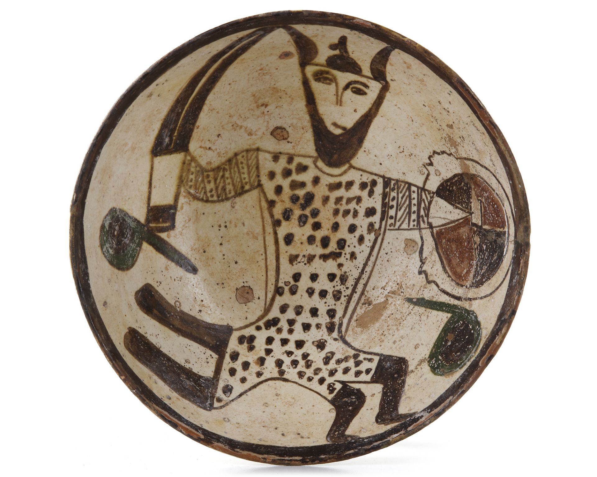 A NISHAPUR FIGURAL BUFFWARE POTTERY BOWL DEPICTING A WARRIOR, PERSIA, 10TH CENTURY