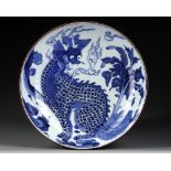 A CHINESE BLUE AND WHITE QILIN DISH
