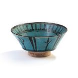 A RAQQA TURQUOISE GLAZED POTTERY BOWL, SYRIA,13TH-14TH CENTURY