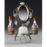 A FRENCH TOILET MIRROR WITH TWO IMARI VASES AND AN OPALINE BACCARAT BOWL, CIRCA 1860