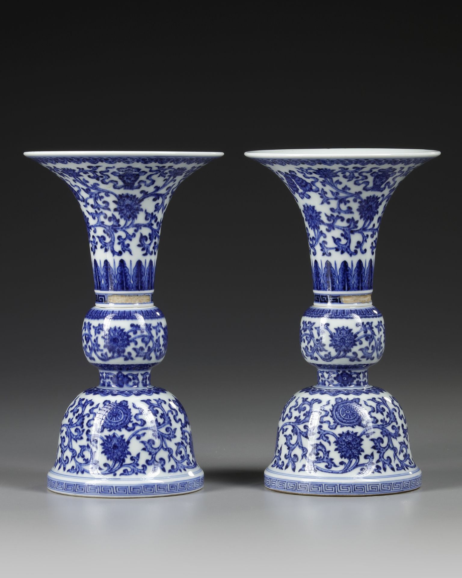 A PAIR OF CHINESE BLUE AND WHITE GU-FORM ALTAR VASES, QING DYNASTY (1644–1911)