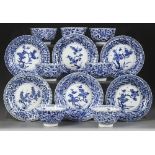A SET OF SEVEN CHINESE BLUE AND WHITE CUPS AND SIX SAUCERS, KANGXI PERIOD (1662-1722)