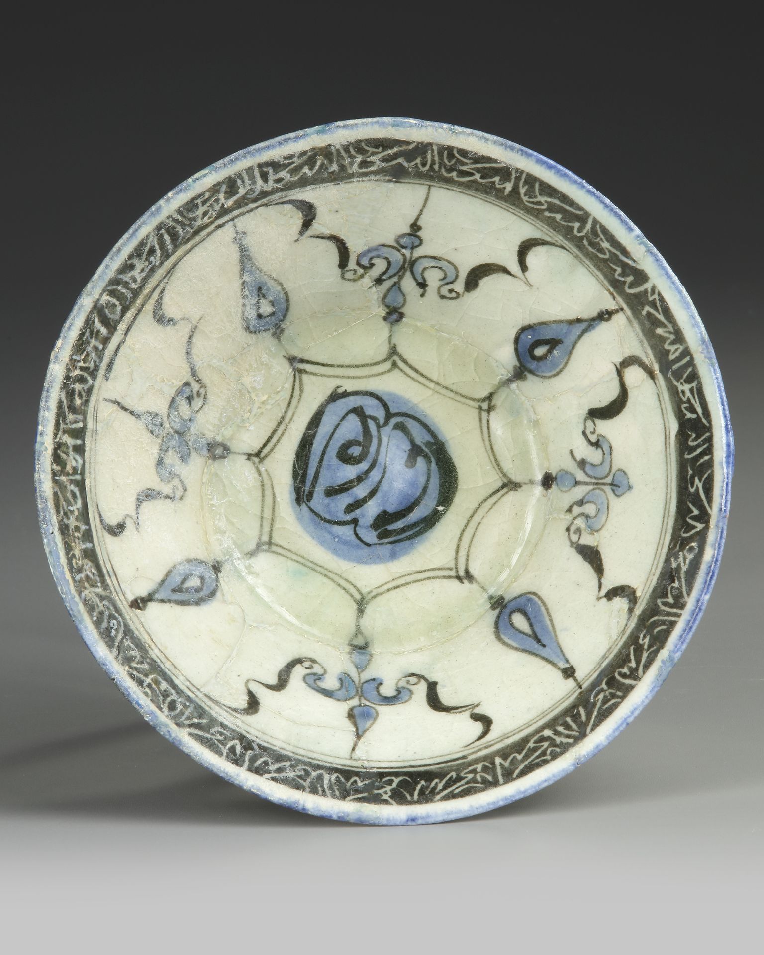 A KASHAN POTTERY BOWL, PERSIA 13TH CENTURY