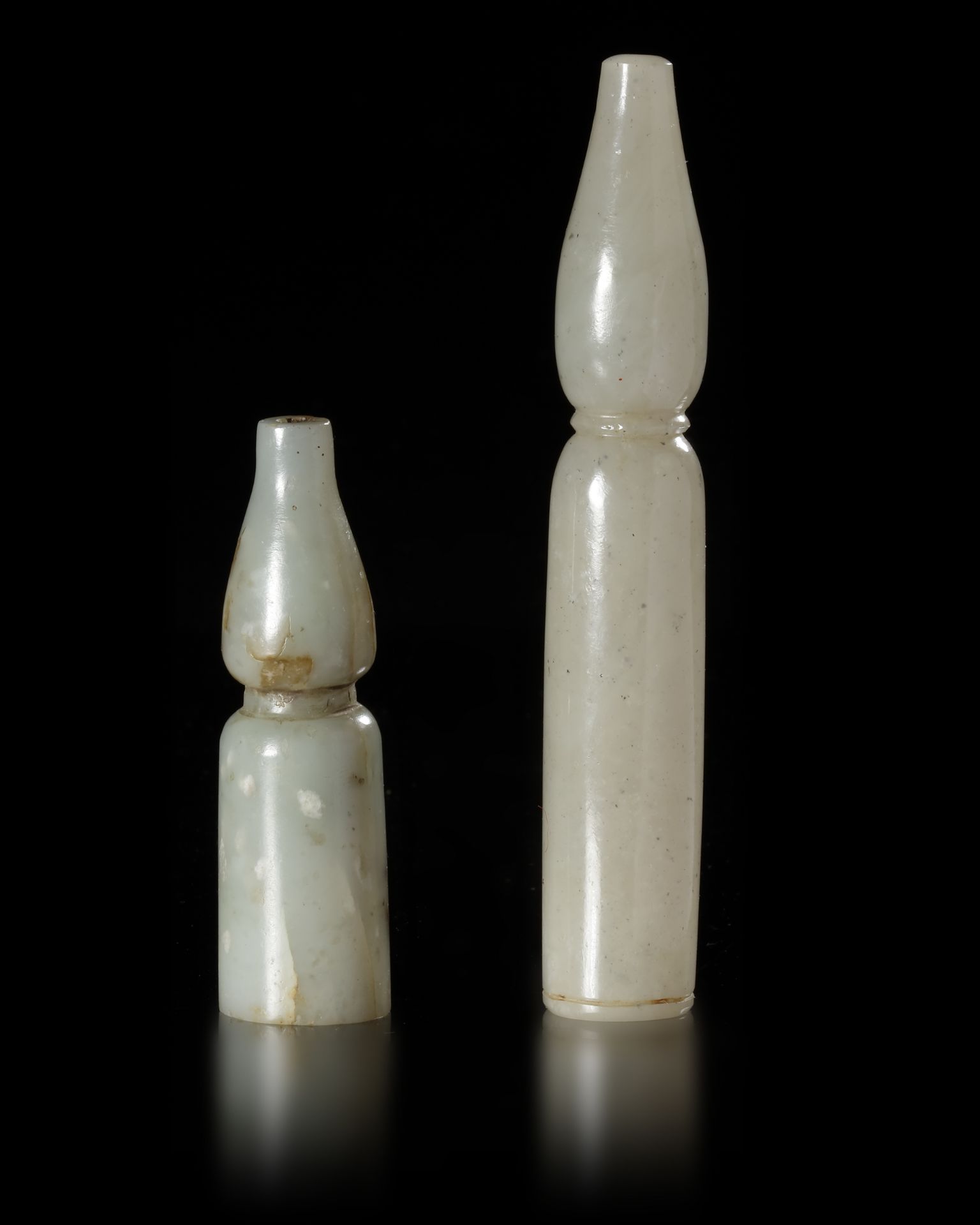 TWO MUGHAL PALE OLIVE GREEN MUGHAL JADE MOUTHPIECES, 18TH-19TH CENTURY