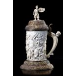 A MAGNIFICENT GERMAN IVORY TANKARD WITH PARCEL GILT MOUNTS DEPICTING AN OTTOMAN BATTLE, MADE FOR TH