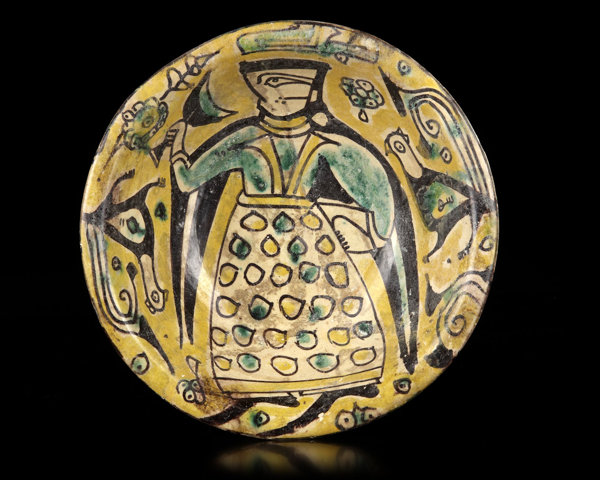 A NISHAPUR POLYCHROME DECORATED BOWL, PERSIA, 10TH CENTURY