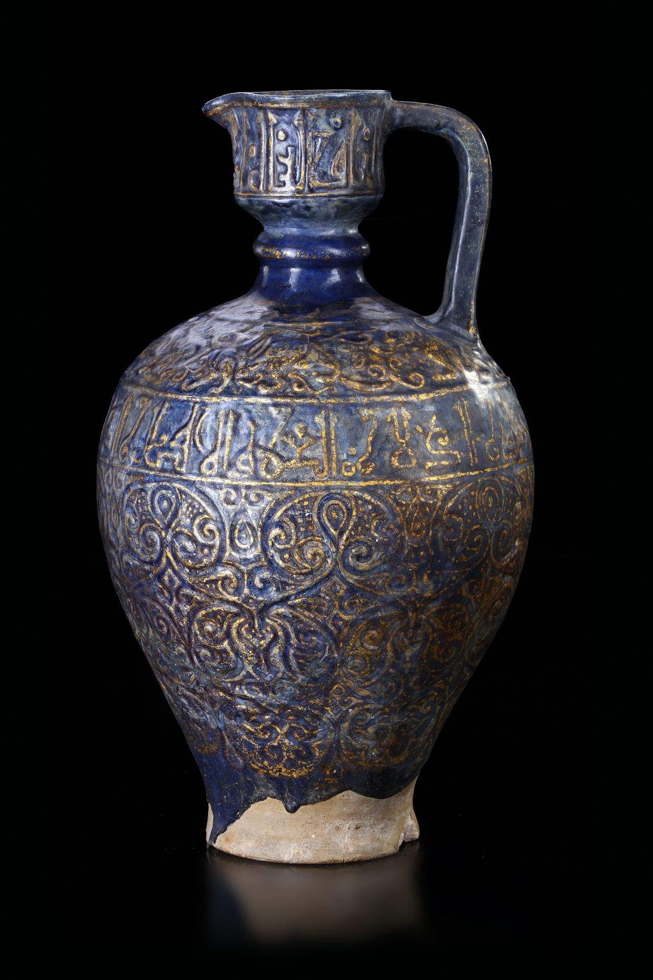 A MONUMENTAL LAJVARDINA POTTERY JUG, ILKHANID PERSIA, 13TH CENTURY