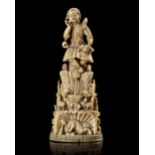 AN INDO-PORTUGUESE CARVED IVORY FIGURE OF CHRIST AS THE GOOD SHEPHERD, INDIA, GOA, 17TH CENTURY