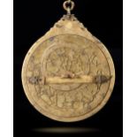 A PERSIAN ASTROLABE MADE BY NAJM AL-DIN MUHAMMAD MUNAJJIM IBN IMAM ALI IBN BAYAZID IBN SAYYID HASAN