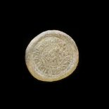 A FATIMID GLASS WEIGHT OF DIRHAM, AL-HAKIM BI-AMR ALLAH (386AH-411AH/ 996AD-1021AD)